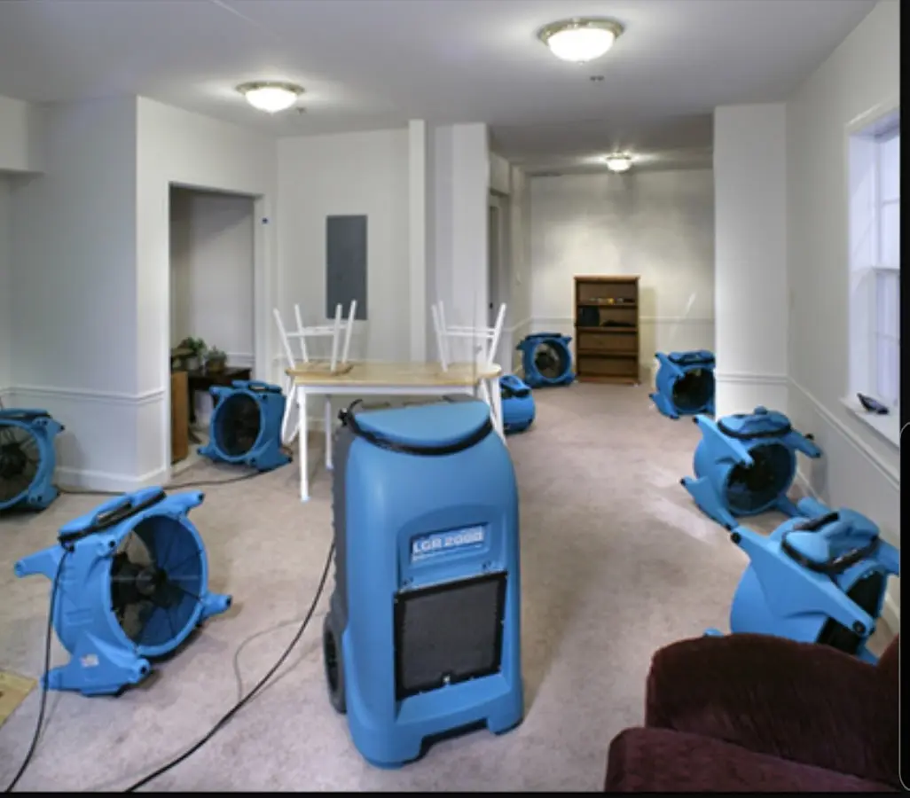 Air movers and dehumidifier setup for Water Damage Restoration in West Milford